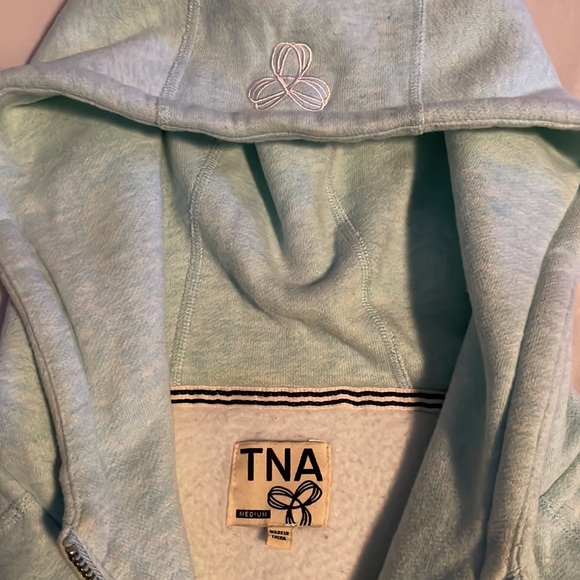 This sweater is a beautiful kind of light teal colour! - Picture 3 of 4